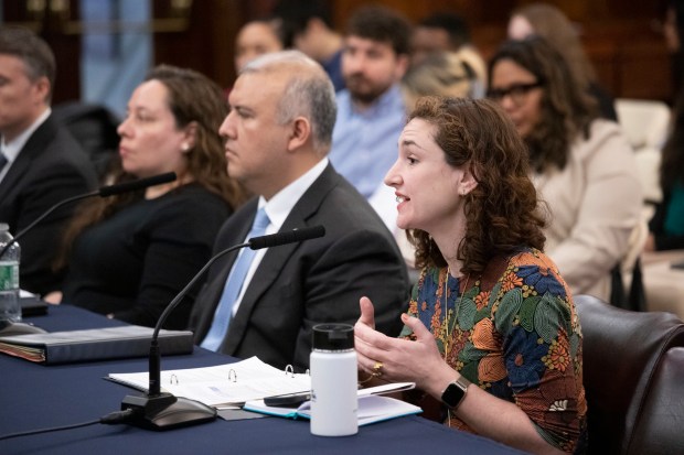 (Right) Molly Schaeffer, interim director of Adams' Office of Asylum Seeker Operations. (John McCarten/NYC Council Media Unit)